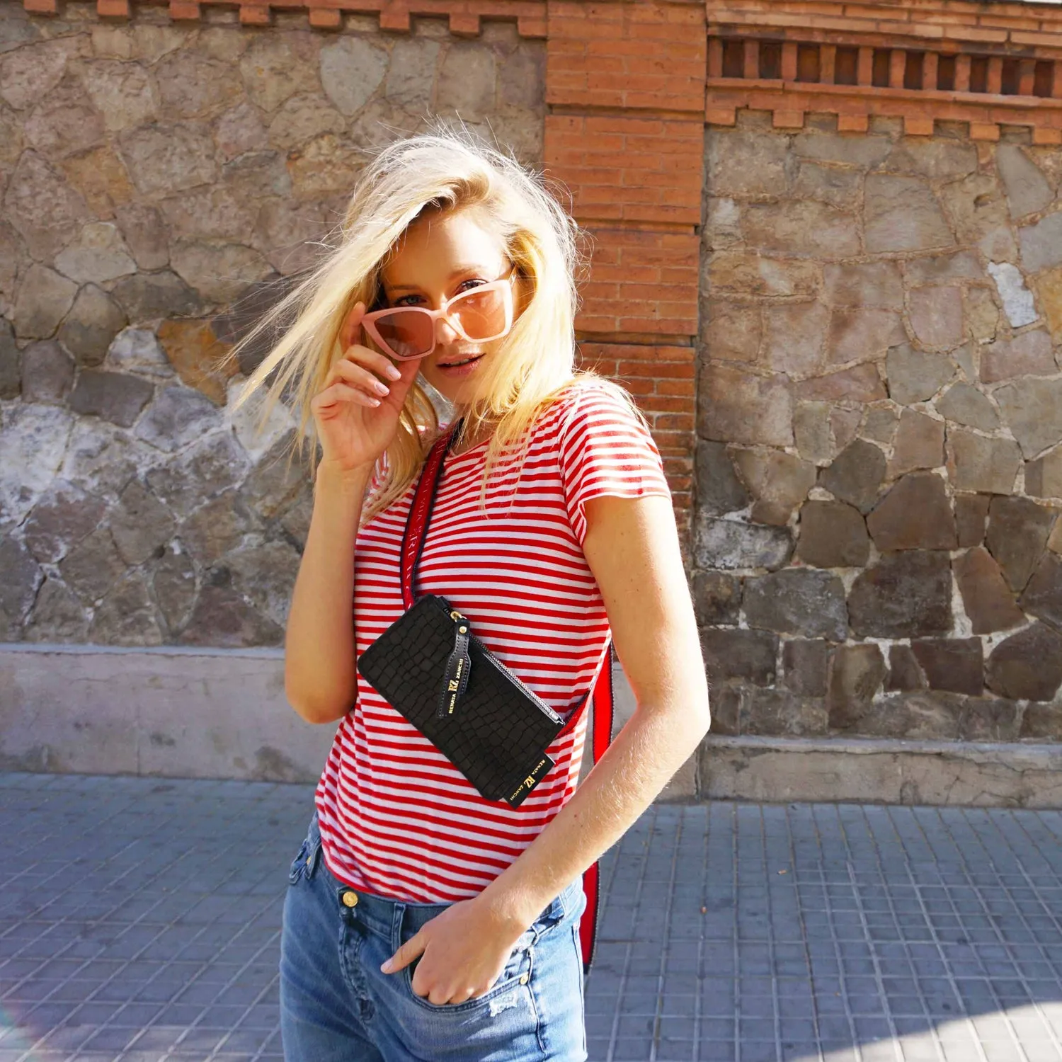 Black little fanny bag with text straps